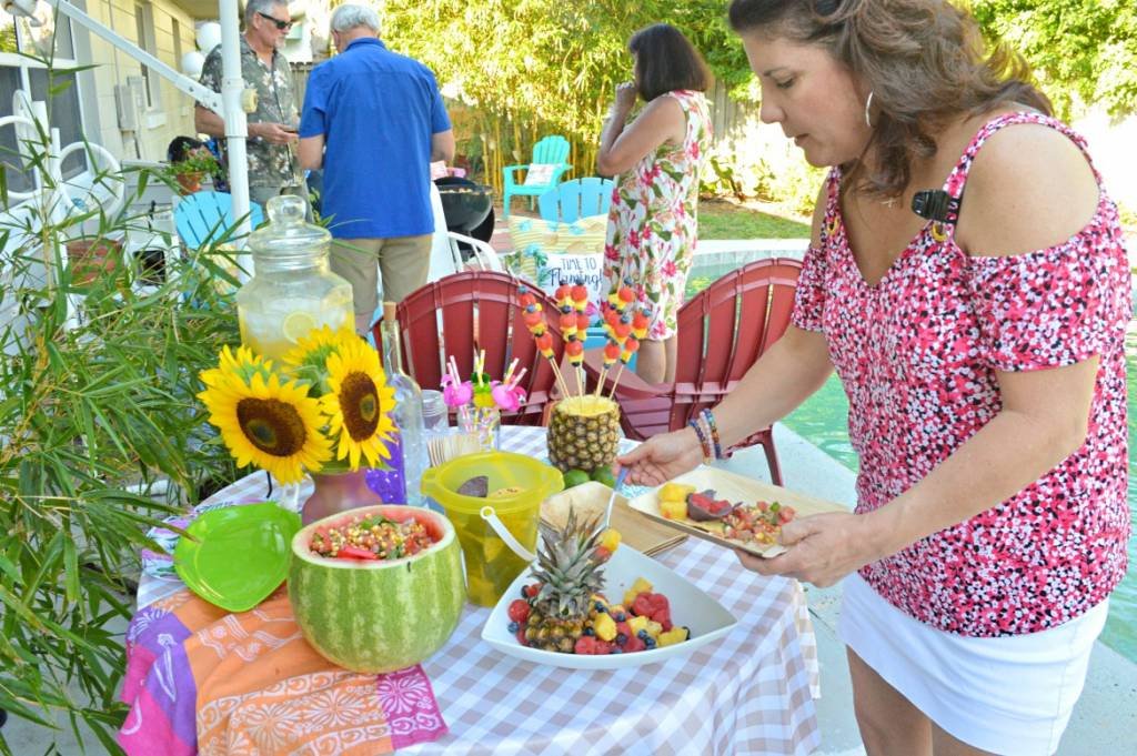 Celebrating Summer With An Outdoor Dinner Party | #ad #freshfromflorida #produceparty | How to throw an eco-friendly summer dinner party | Summer outdoor party idea featuring fresh produce | Summer pool party recipes and outdoor party decorations | Celebrating summer with Fresh From Florida recipes | Watermelon and sweet corn recipes | #summerparty #freshrecipes #cornsalsa #fruitrecipes | theMRSingLink