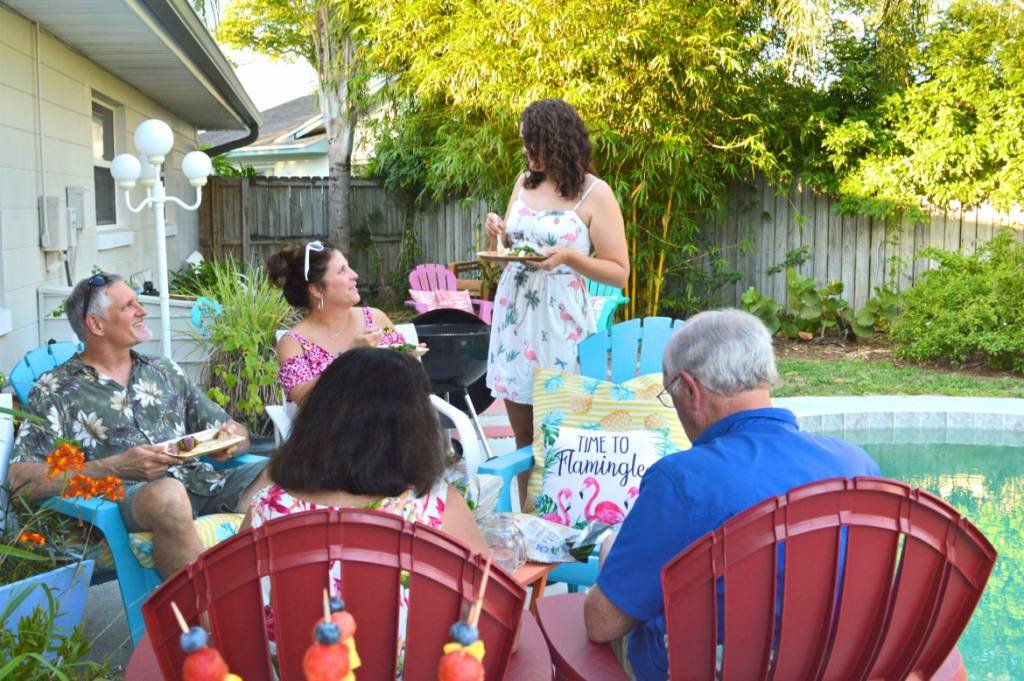 Celebrating Summer With An Outdoor Dinner Party | #ad #freshfromflorida #produceparty | How to throw an eco-friendly summer dinner party | Summer outdoor party idea featuring fresh produce | Summer pool party recipes and outdoor party decorations | Celebrating summer with Fresh From Florida recipes | Watermelon and sweet corn recipes | #summerparty #freshrecipes #cornsalsa #fruitrecipes | theMRSingLink