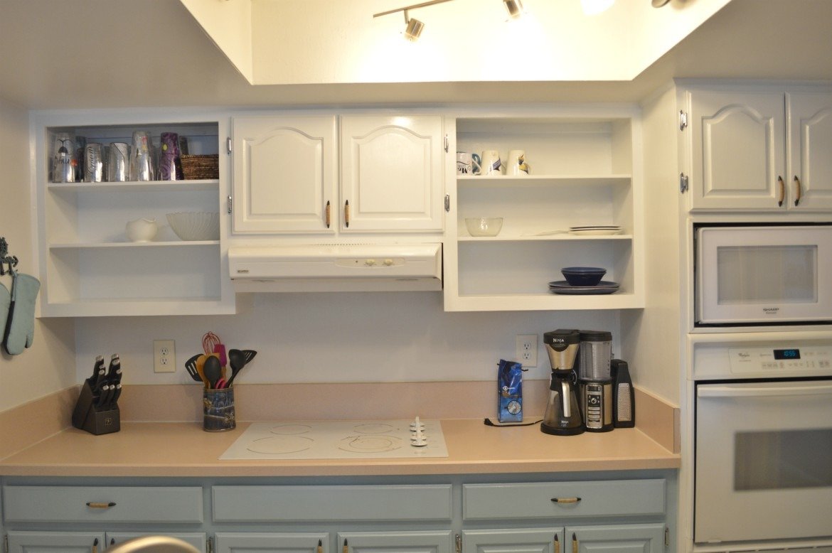 9 Crucial Steps To Painting Wood Cabinets DIY Painting Wood Kitchen Cabinets Small Kitchen DIY Renovation How to paint wood cabinets DIY before and after DIY tips DIY Home Improvements | #DIY #homeimprovements | theMRSingLink