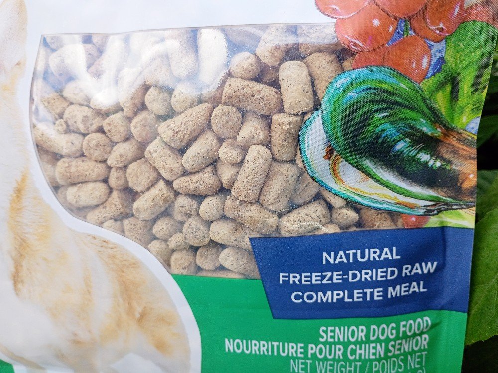 I'm sharing my story on why I stopped feeding my dog kibble, the alternatives and their pros and cons. (In this photo: Dr. Marty Nature's Blend Active Vitality)